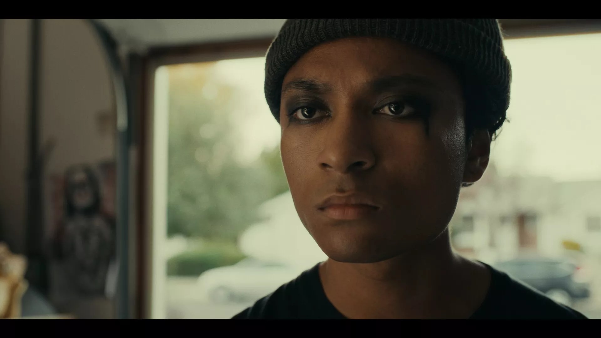 A teen with black eye makeup