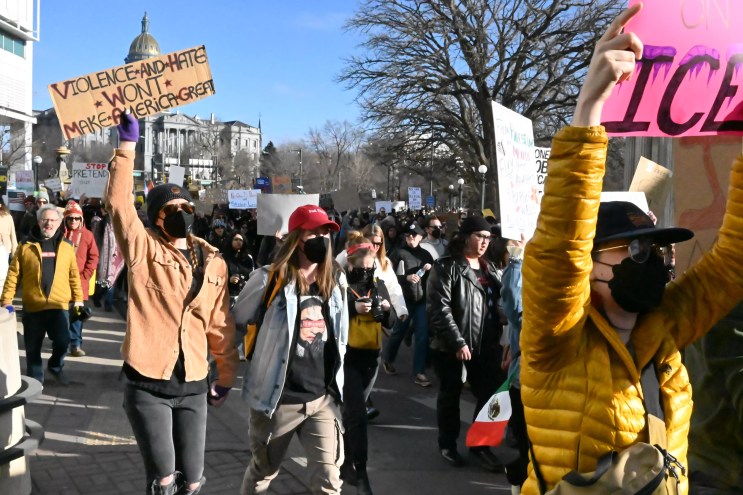 Protesters walk the streets.