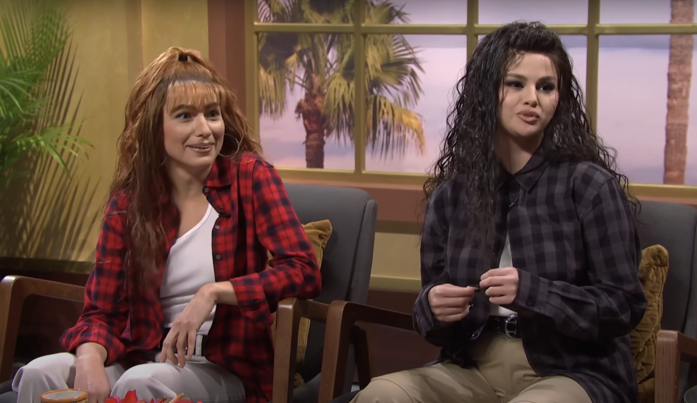 Two women sit next to each other