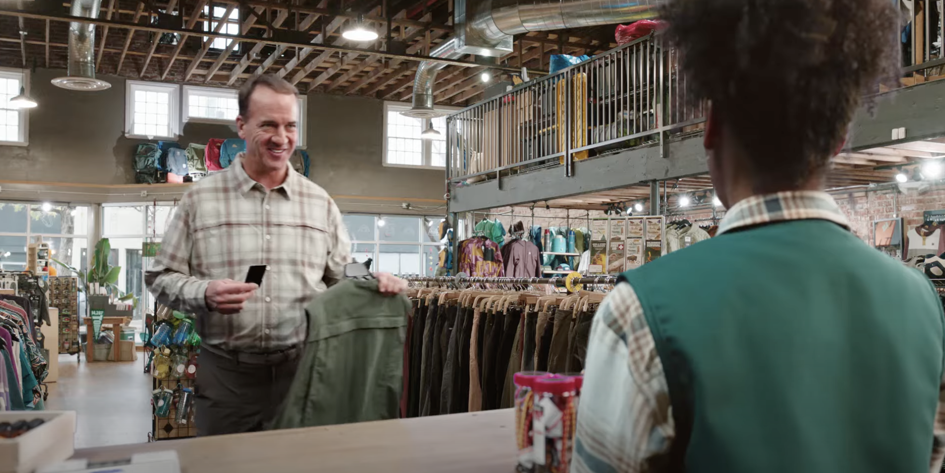 A man at a checkout counter
