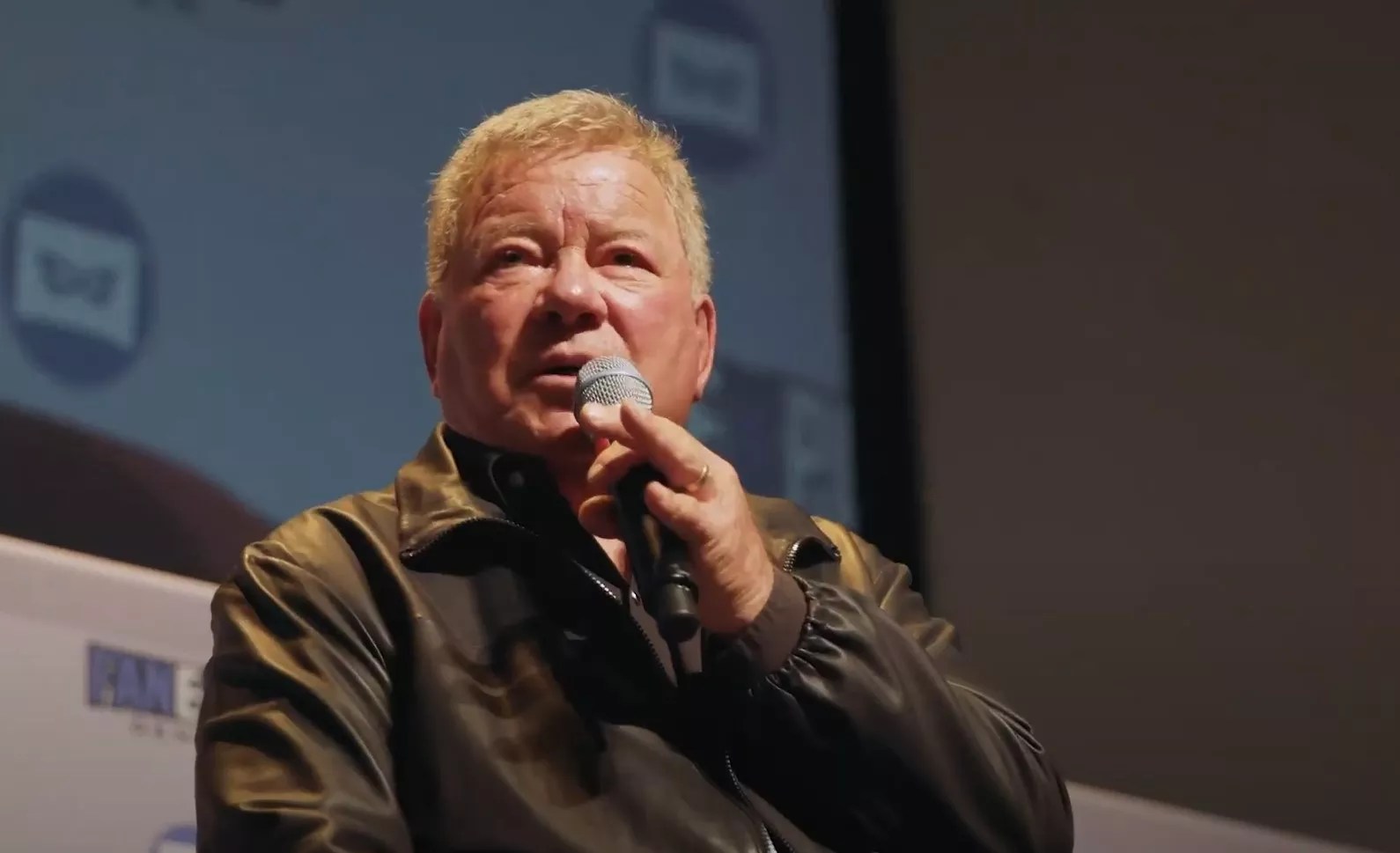 A man with a microphone