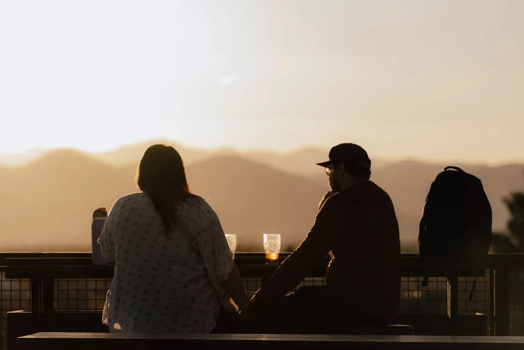 Rooftop patio with mountain views.