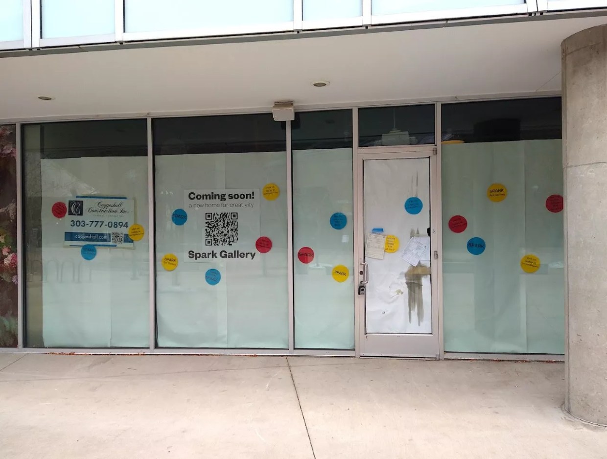 A building with glass windows covered up