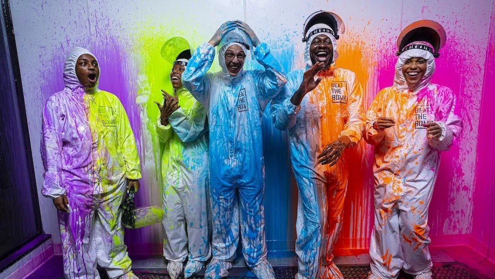 People splattered in paint