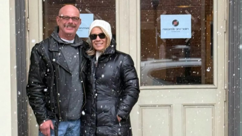 a wife and husband smiling