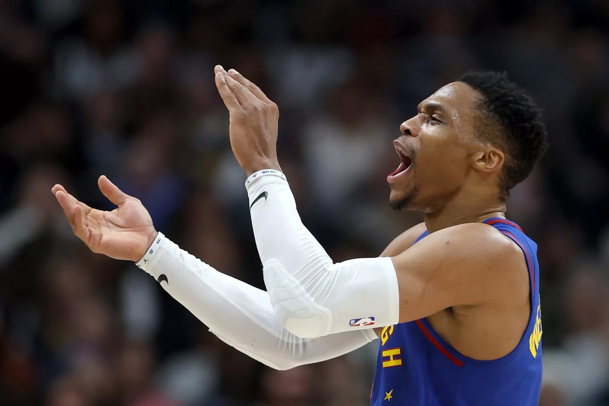 Russell Westbrook celebrates for the Denver Nuggets