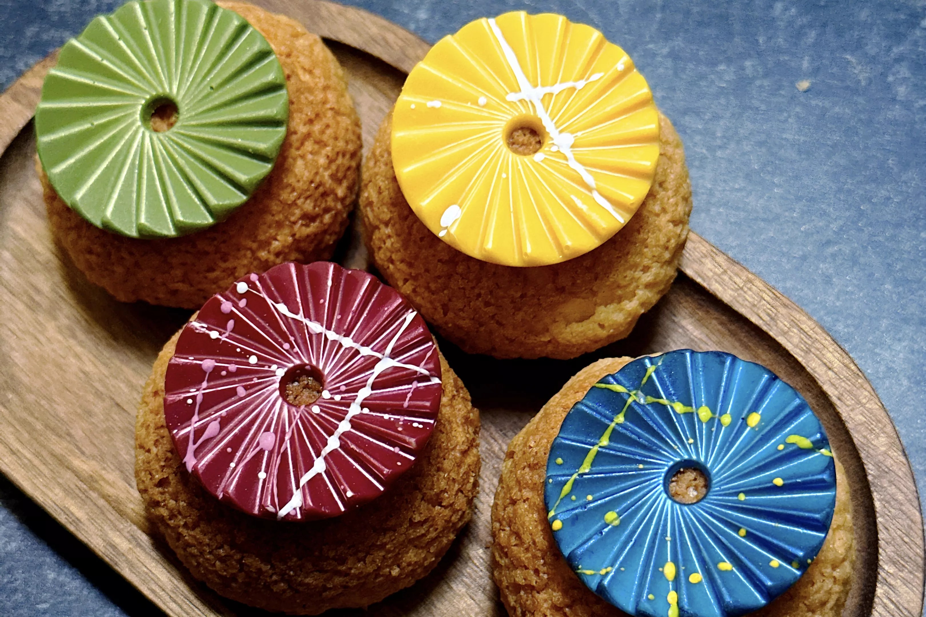 Four colorful, circular confections from Sweet Rice Flour