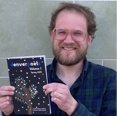 A man holding a book