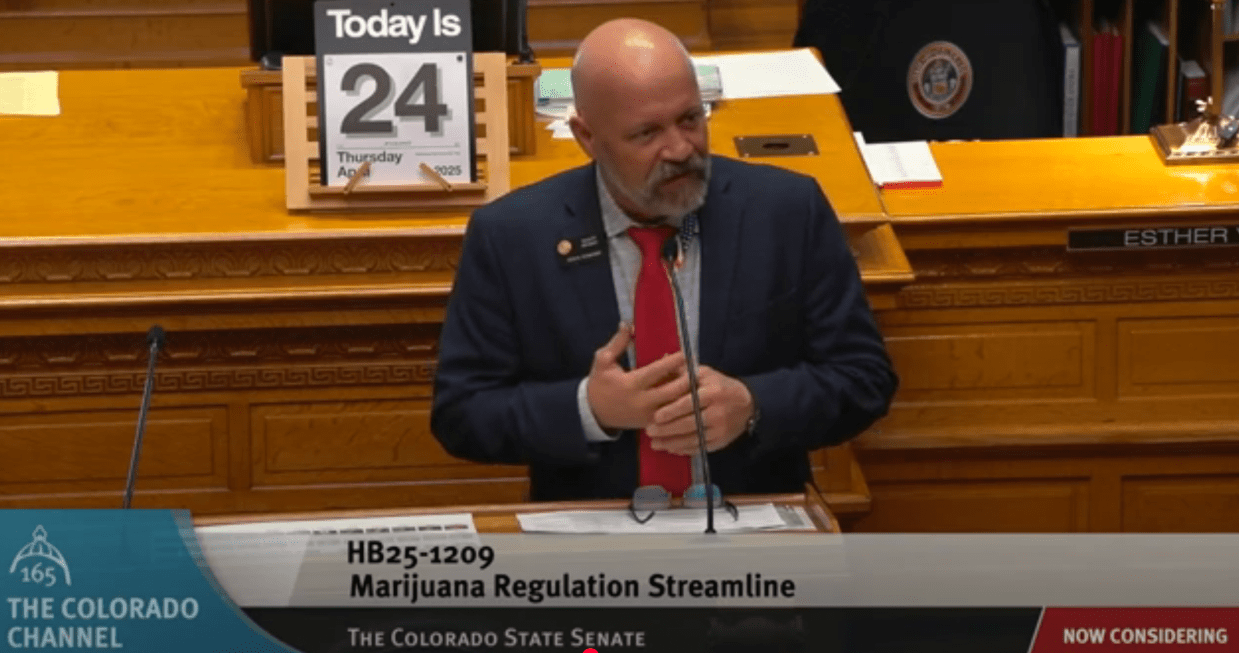 Senator speaks at podium before bill vote