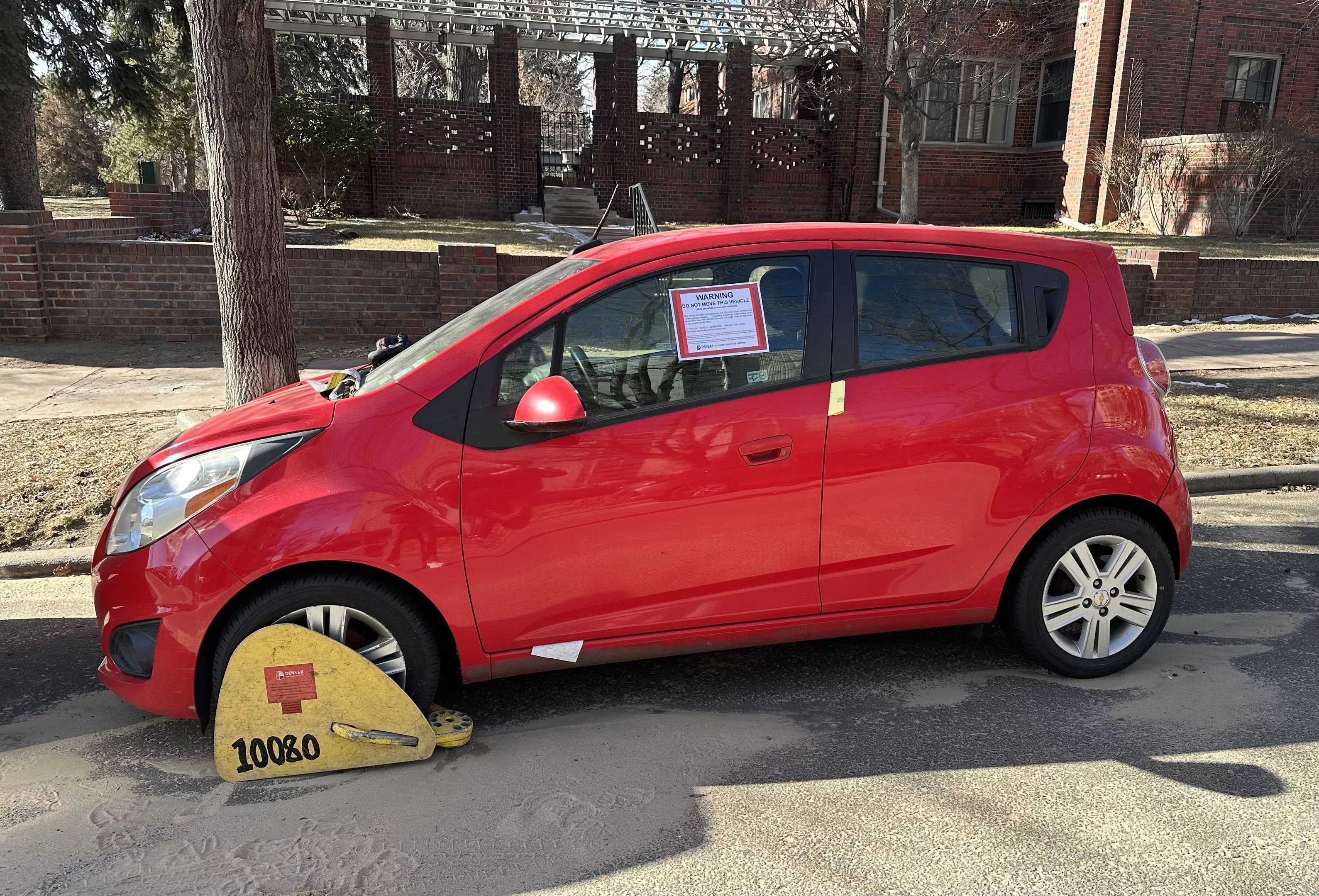 Abandoned car parked in Denver