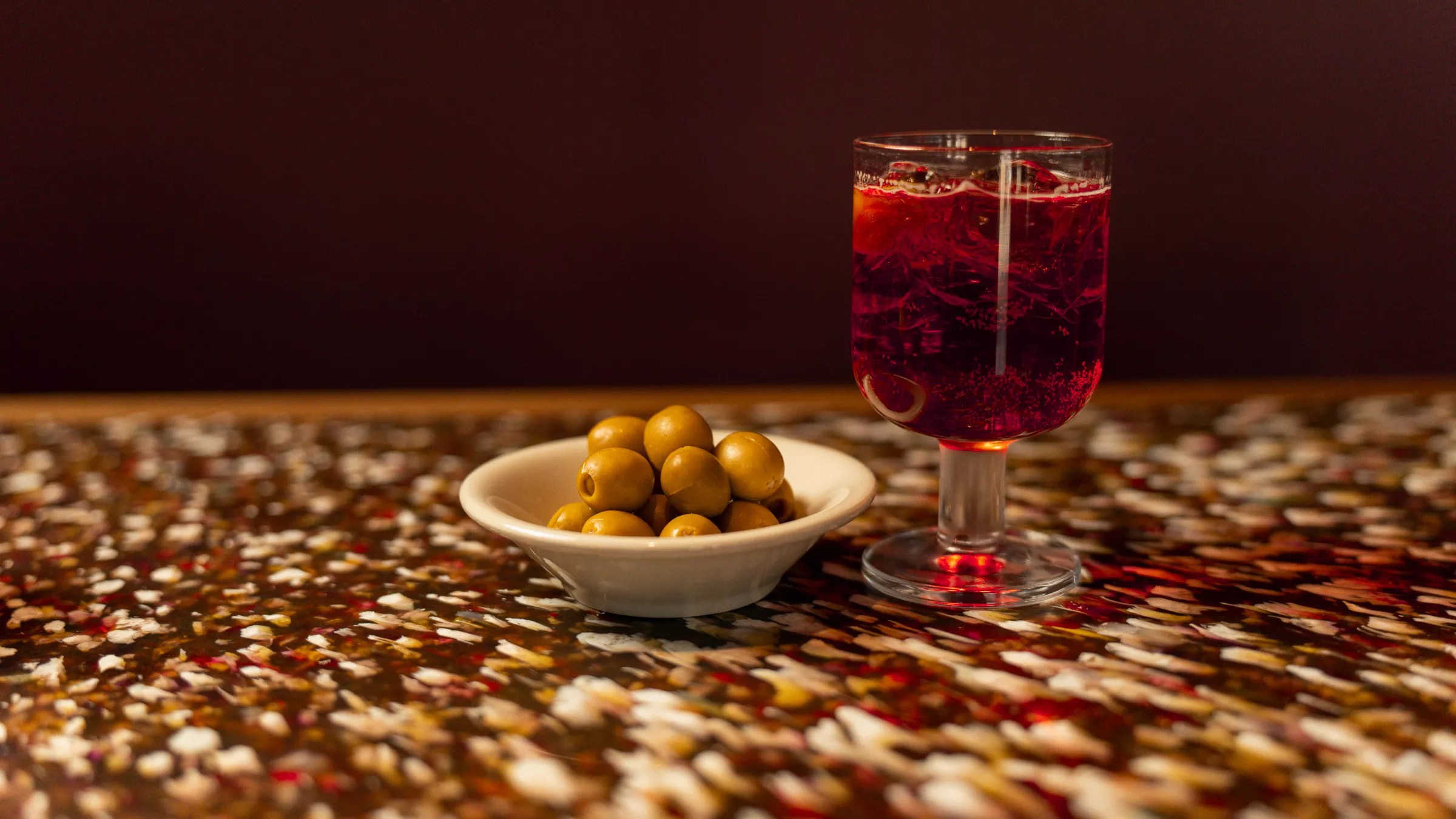 Olive and cocktail at Semiprecious