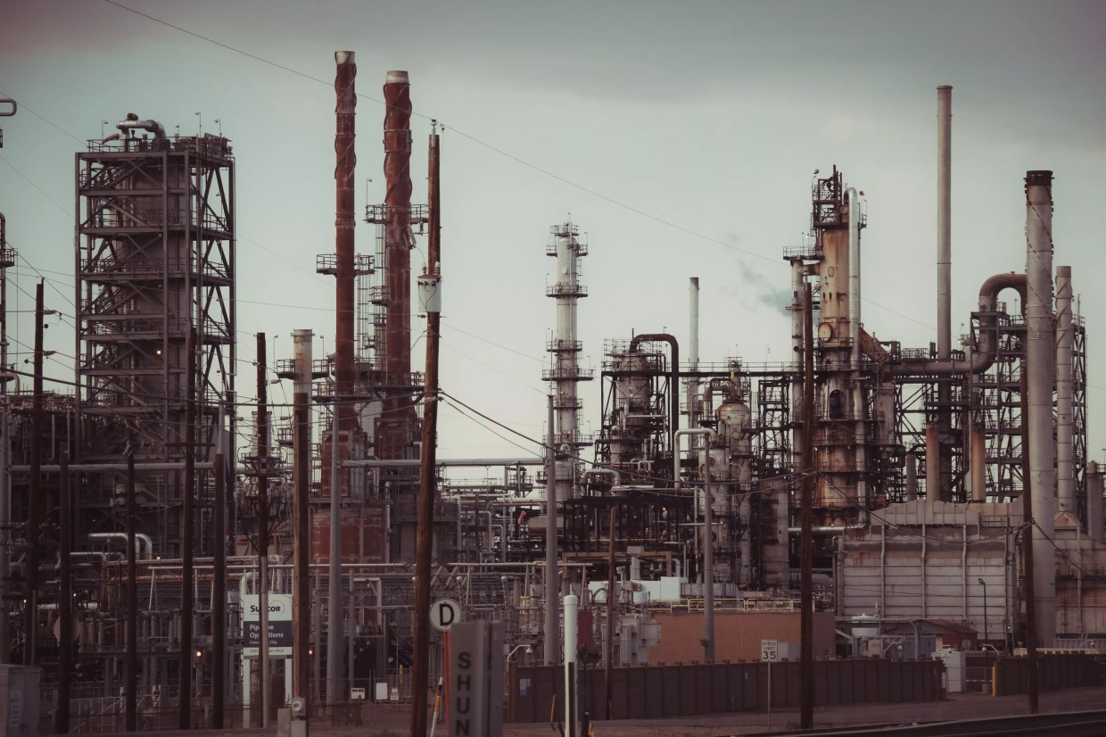 Oil refinery with gray skies