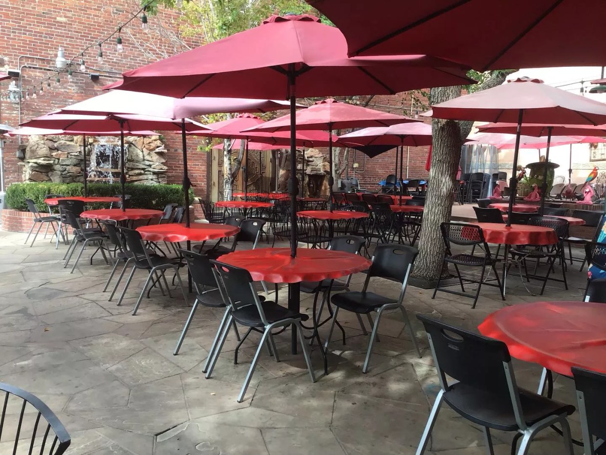 patio with red umbrellas