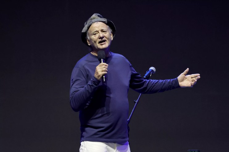 bill murray speaking into a microphone