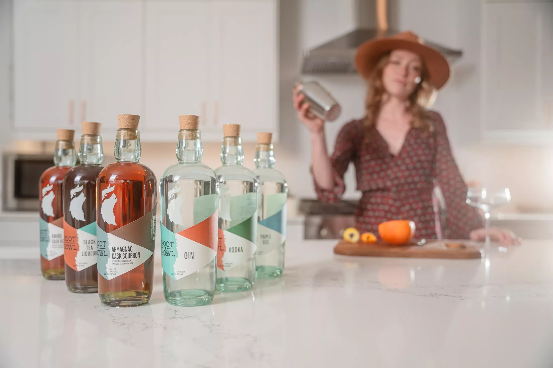 Spirits in a lineup on a counter.
