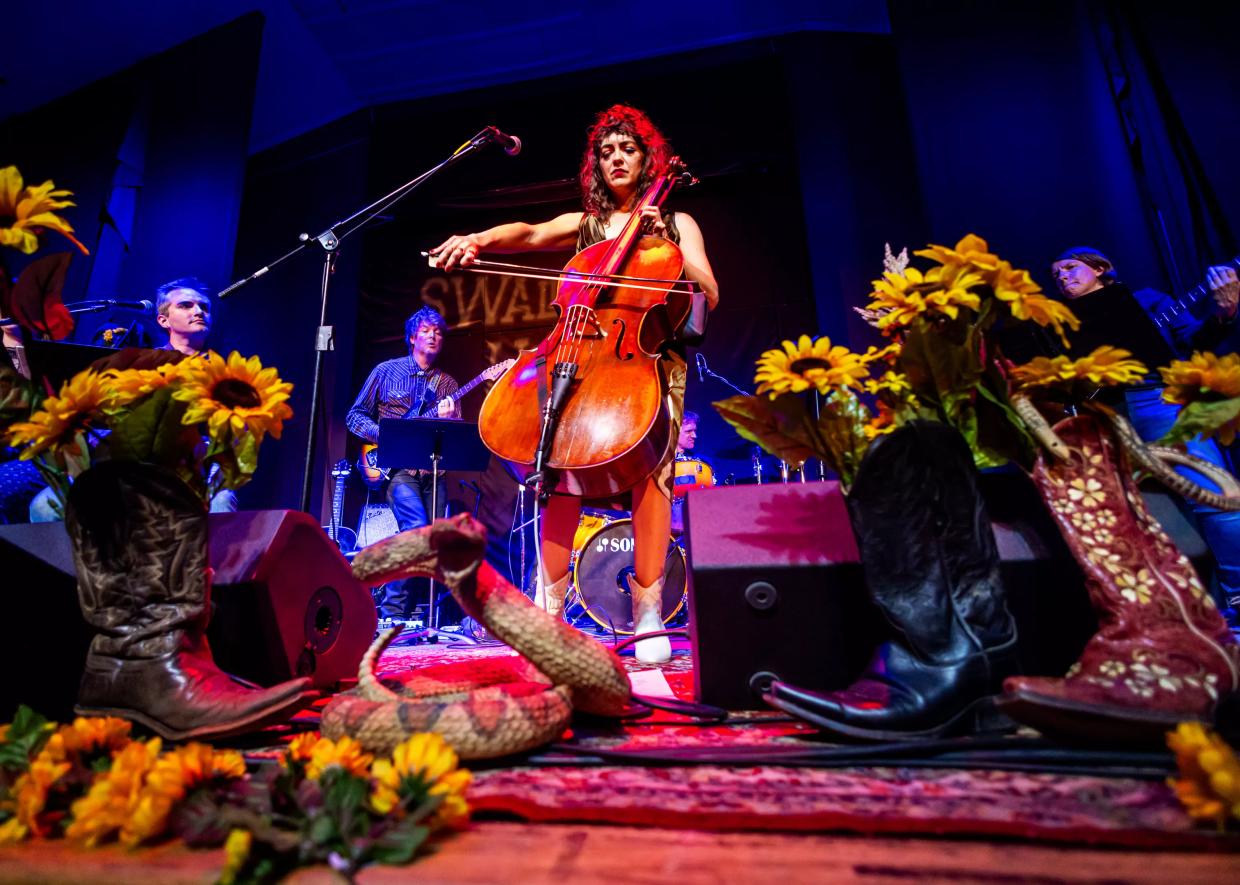 A woman plays cello