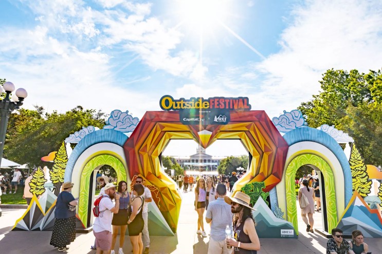 Festival attendees enter the Outside Festival on Saturday.