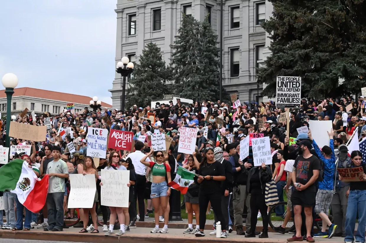 Crowd of anti-ICE protesters on steps of Denver capitol