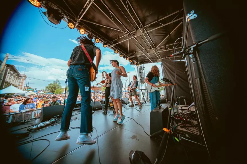 band on outdoor stage.