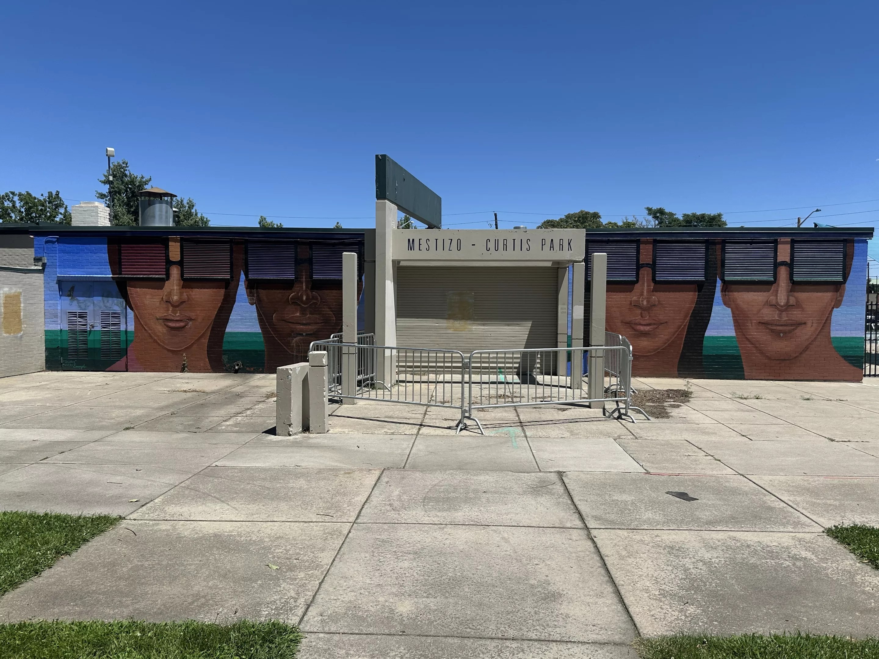 a mural painting of people with sunglasses