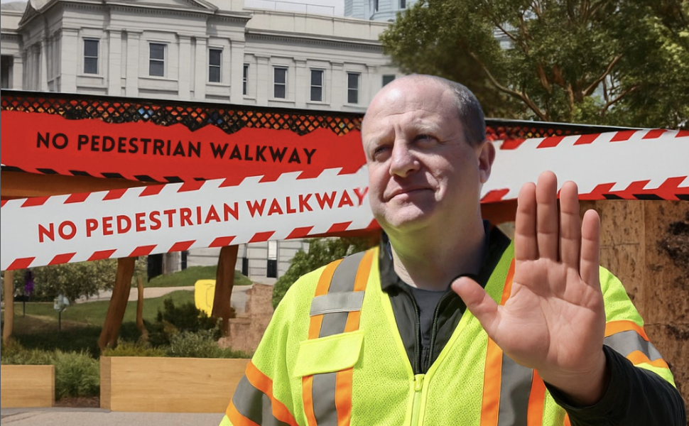 man in yellow  work vest
