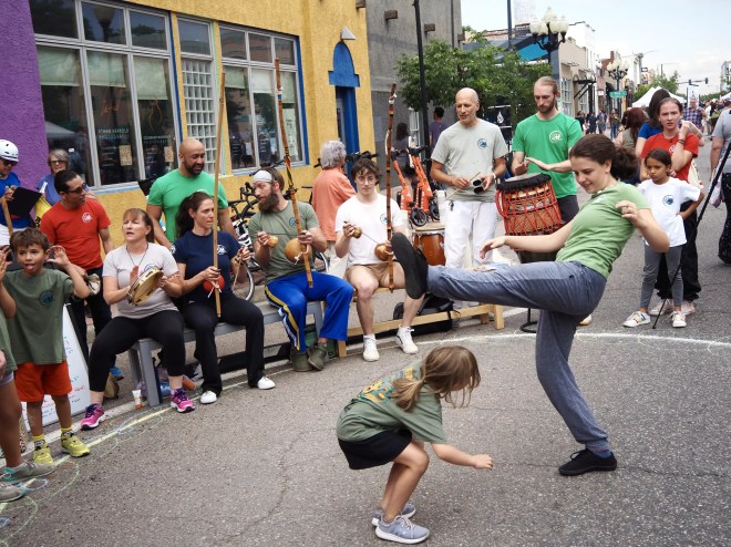 street dancers dance in a drum circle